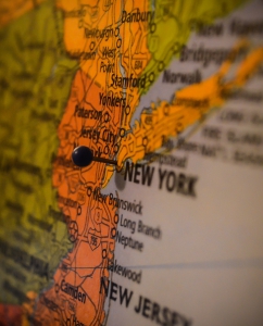 Photo of map of New York with pin in it by Steve Richey on Unsplash