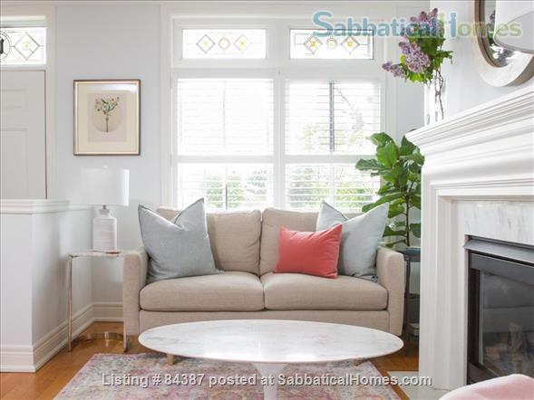 SabbaticalHomes Listing 84387. A clean and uncluttered living room of a home rental in Toronto, Canada. 
