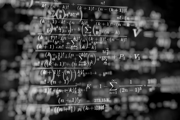 mathematical formulas on a black background; photo credit: elchinator