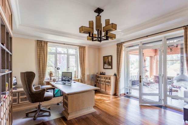 home office with chair and desk; Photo by Алан Албегов